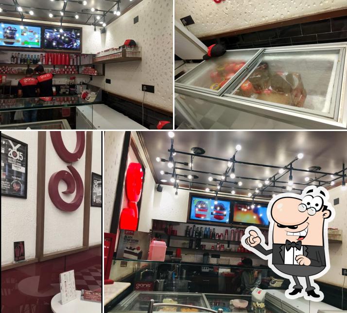 Take a seat at one of the tables at Giani ice cream