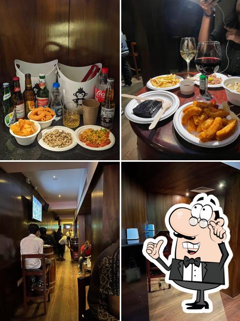 This is the picture depicting interior and food at Pegs N Bottles - The Standing bar