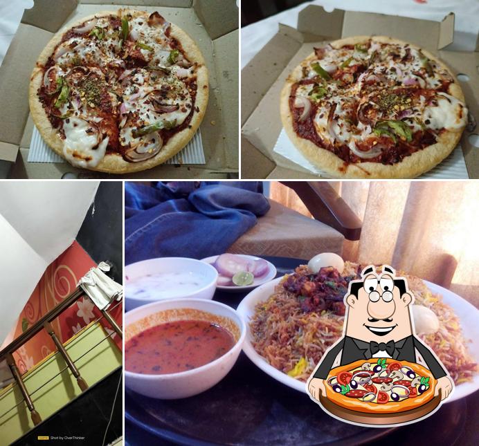 Get pizza at Hotel Meghana