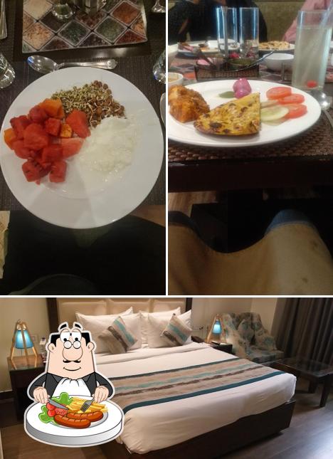 The photo of food and interior at WJ Grand Hotel