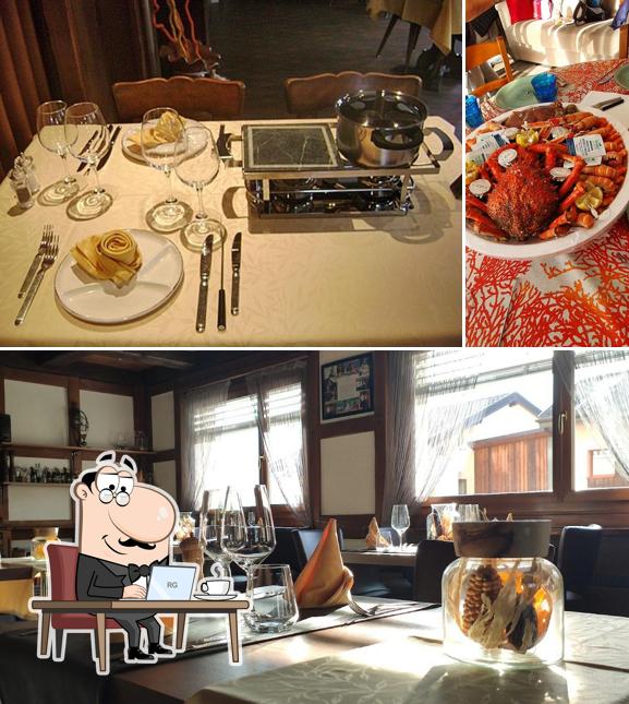 Questa è la immagine che mostra la interni e tavolo da pranzo di Le Postillon