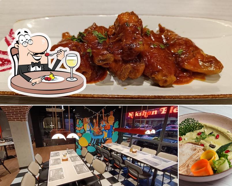 Among various things one can find food and interior at The Grillax Kannur