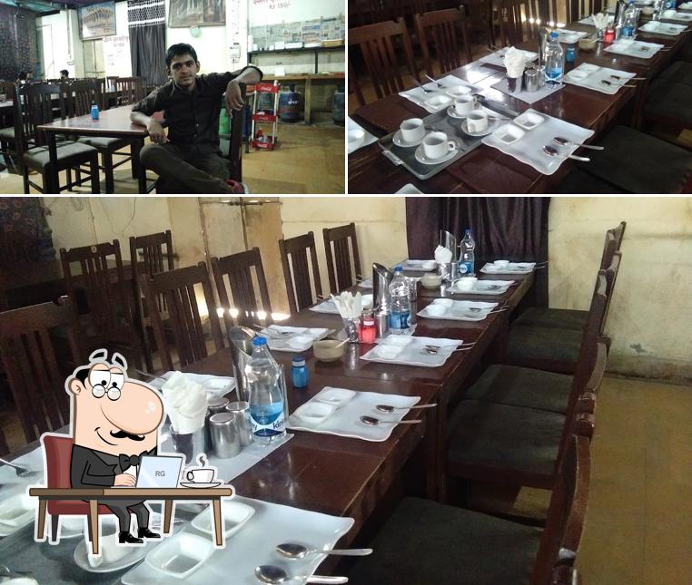 Take a seat at one of the tables at Swagatam Restaurant Jaisalmer