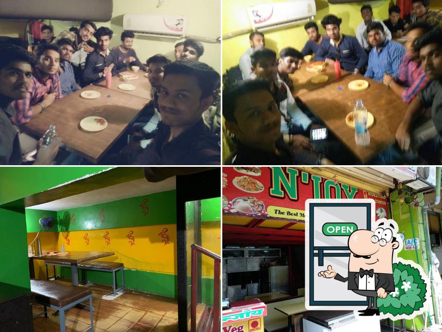 Check out the photo displaying exterior and dining table at N JOY SNACKS &CHINESE