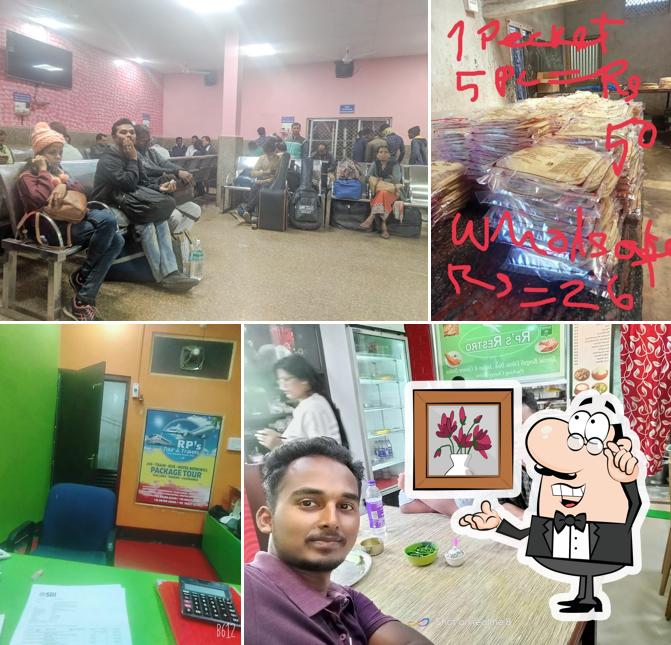 Take a seat at one of the tables at Rps Restro 12 Anna Bengali Thali