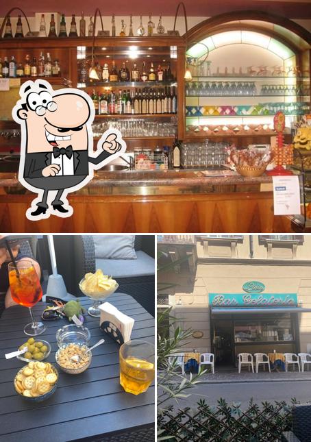 Tra le varie cose da Bar Gelateria Lidia si possono trovare la interni e vino