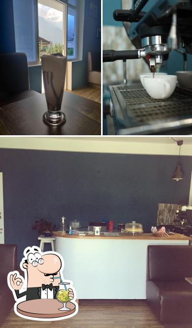 Take a look at the image displaying drink and interior at LIGHTHOUSE CAFE