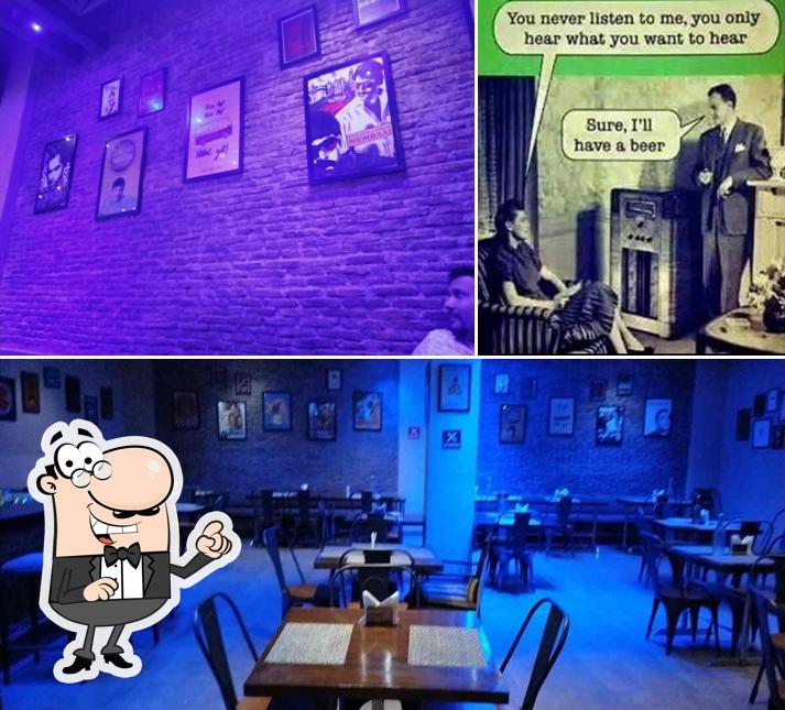 Take a seat at one of the tables at Patiala peg bar and restaurant