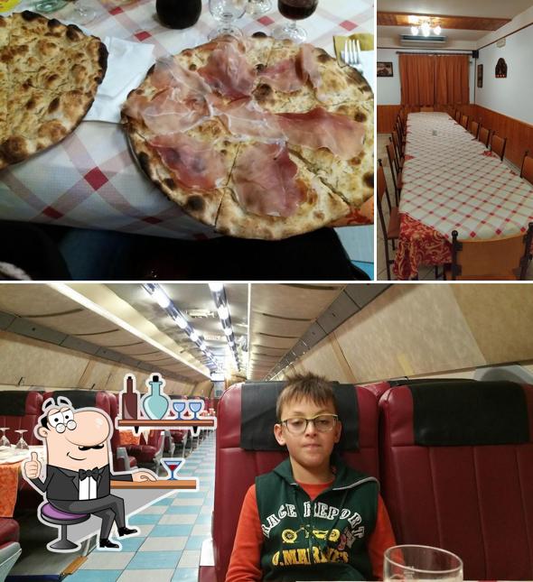 Tra le varie cose da Pizzeria Ristorante Caravelle si possono trovare la interni e pizza