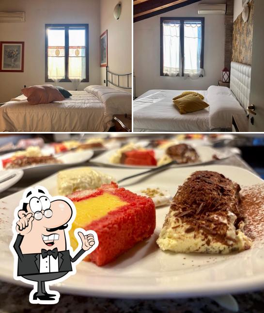 La foto di interni e cibo da La Divina Country House