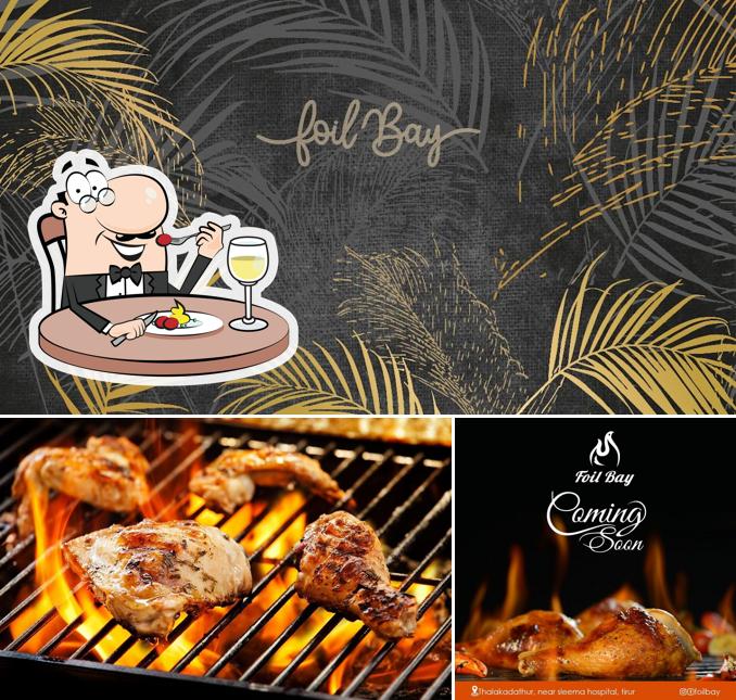 This is the picture showing food and blackboard at FOIL BAY