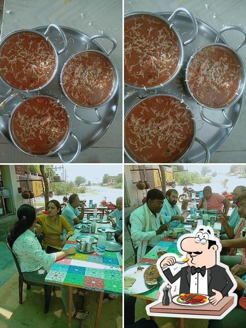 The photo of food and dining table at Hotel Purohit