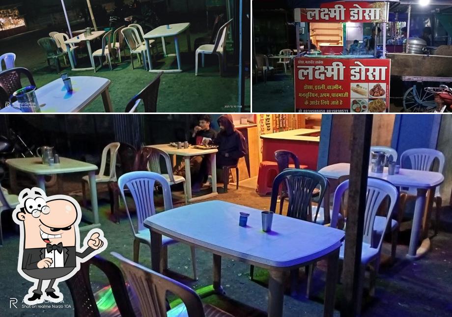 Take a seat at one of the tables at LAXMI DOSA CENTRE BARHI, KATNI, M.P
