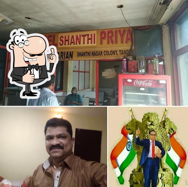 Look at the picture of Shanthi Priya Hotel