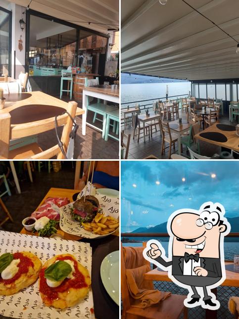 Dai un'occhiata agli interni di Ajò Drink & Food