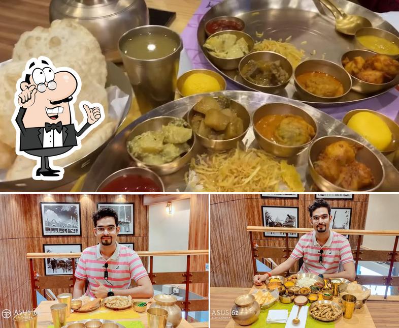 Check out the image showing interior and food at 6 Ballygunge Place Takeaway Jadavpur