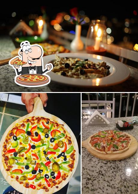 Try out pizza at South Grills Rooftop Restaurant
