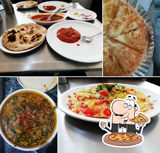 Get pizza at Devas Kitchen