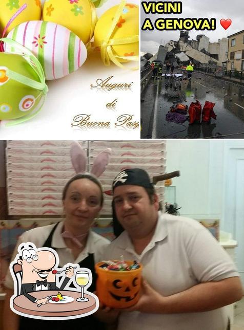 L'Aquila Pizzeria d'asporto si caratterizza per la cibo e esterno