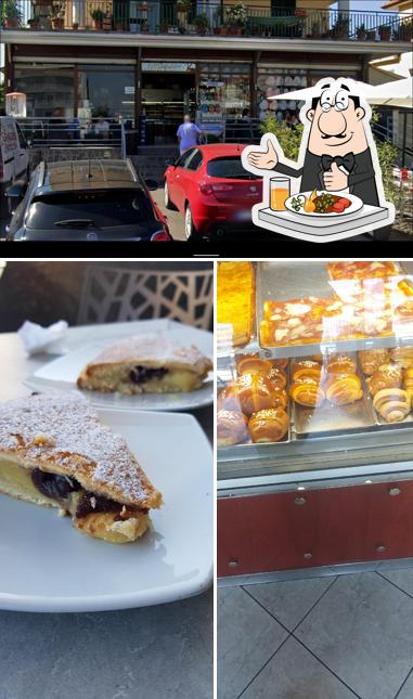 Questa è la foto che mostra la cibo e esterno di La Grandiosa