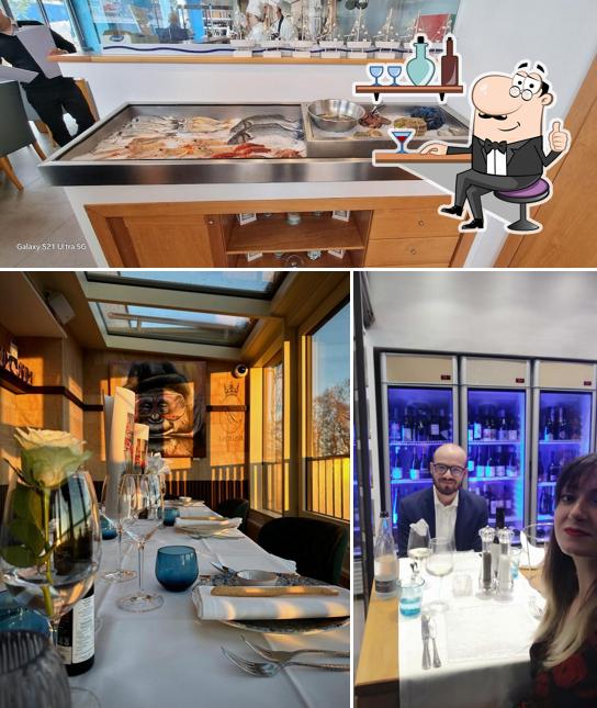 La immagine della interni e cibo di Crudo E Bollicine