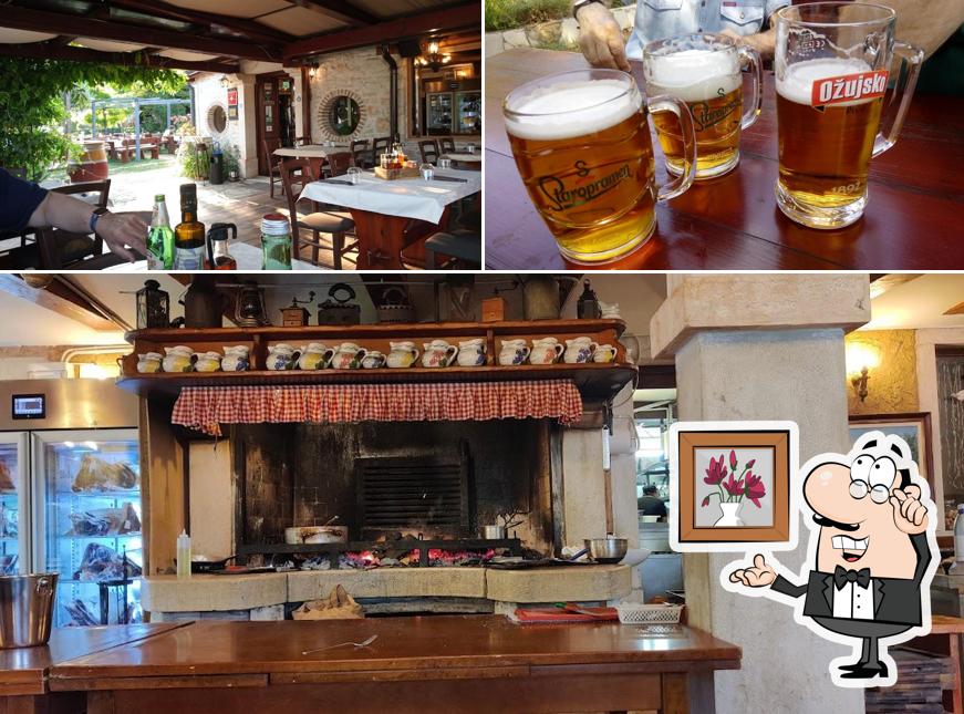 Guarda la foto che presenta la interni e birra di Konoba Rustica