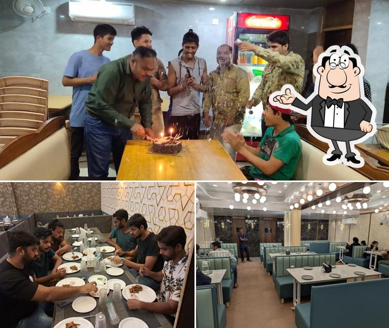 Take a seat at one of the tables at Dawat Restaurant