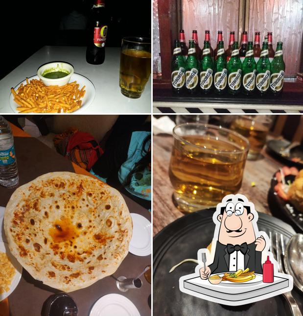 Taste French fries at Paradise Restaurant & Bar