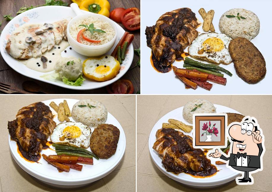 The photo of interior and food at New Labong Cafe and Steakhouse
