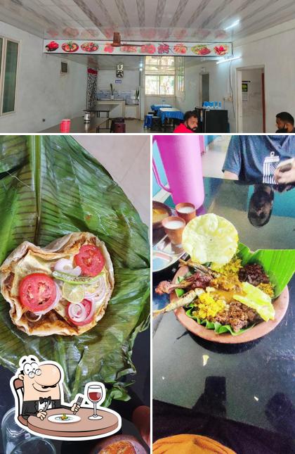 The photo of food and interior at Hotel Poongavanam