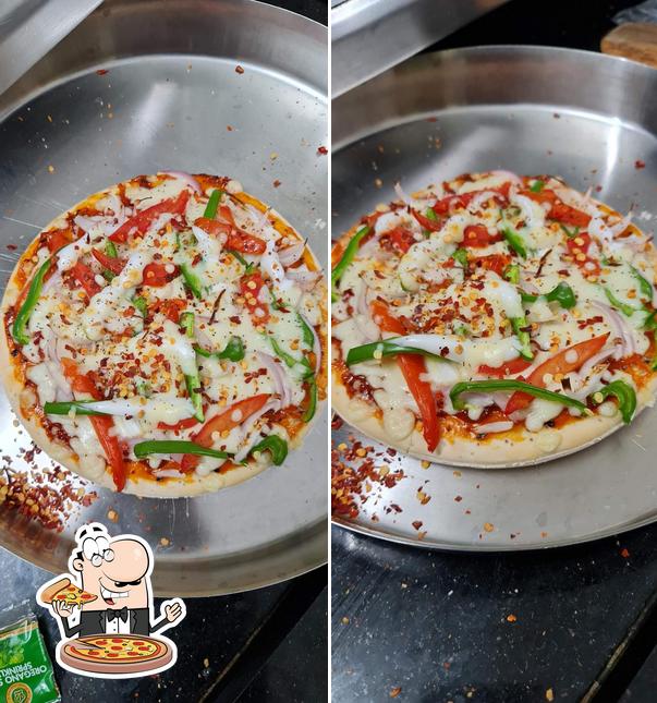 Try out pizza at HOTEL LB,Bar And Restaurant