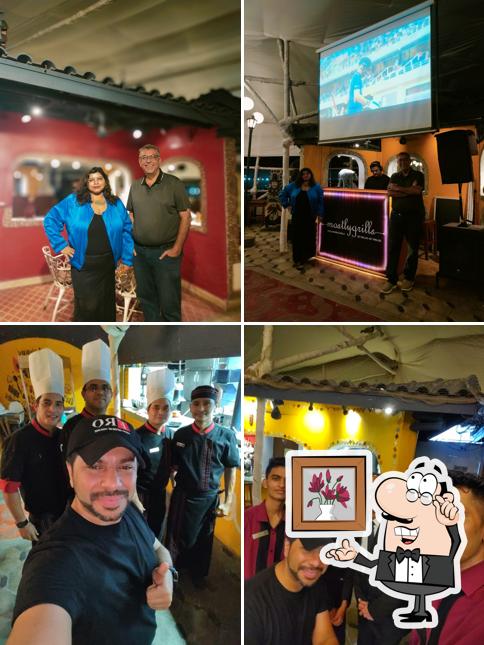 Take a seat at one of the tables at Mostly Grills