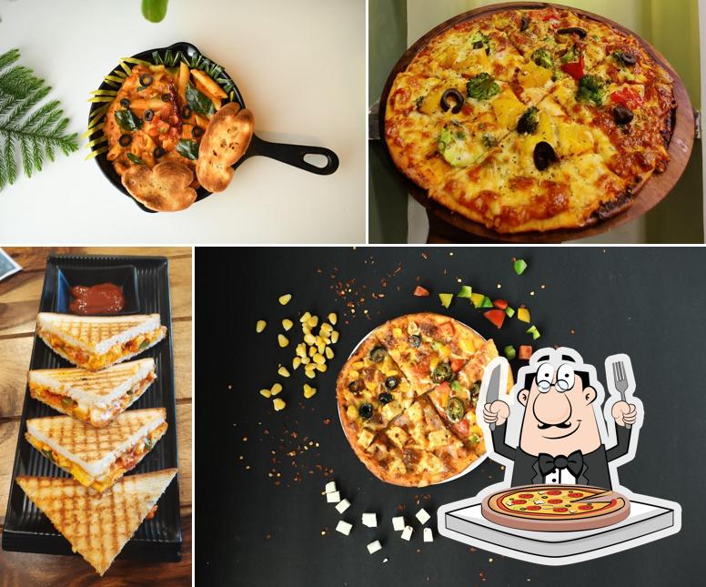 Try out pizza at Karma Kaapi Bhilwara