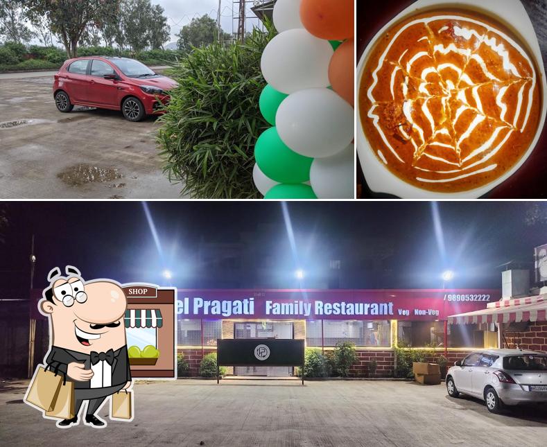 This is the picture showing exterior and beverage at Hotel Pragati Family Restaurant
