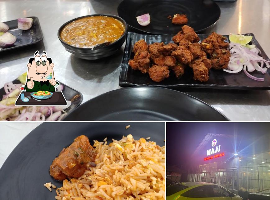 Check out the photo displaying food and exterior at Maji Punjabi Dhaba