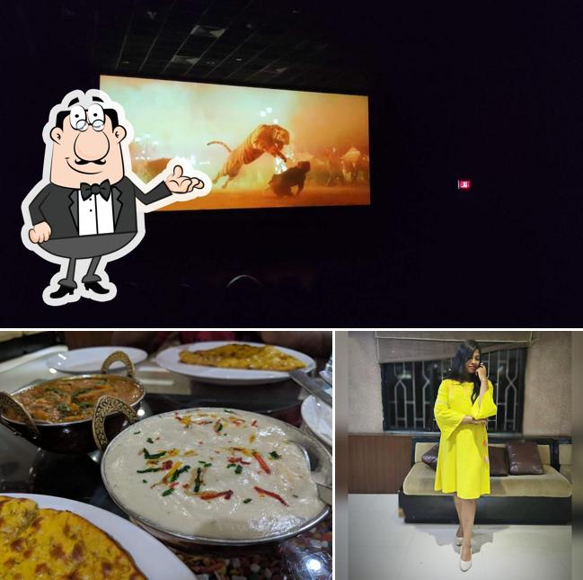 The image of interior and pizza at Mirch Masala Veg Restaurant