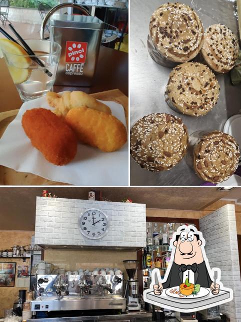 Questa è la immagine che presenta la cibo e interni di Bar Bravetta