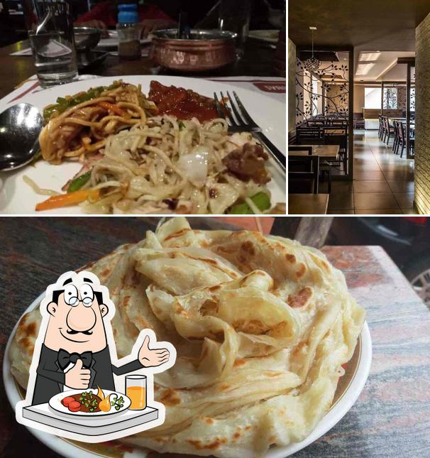 This is the photo depicting food and interior at Hotel Elite International