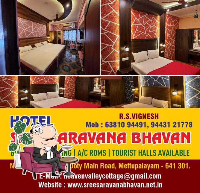 Take a seat at one of the tables at Hotel Sree Saravana Bhavan