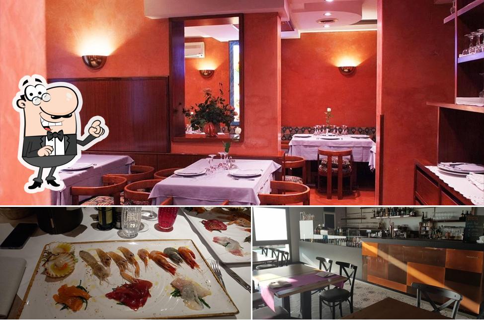 Questa è la immagine che presenta la interni e cibo di Leonzio Ristorante e Cantinetta