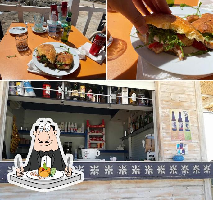 Questa è la immagine che raffigura la cibo e interni di La Baia Dei Venti