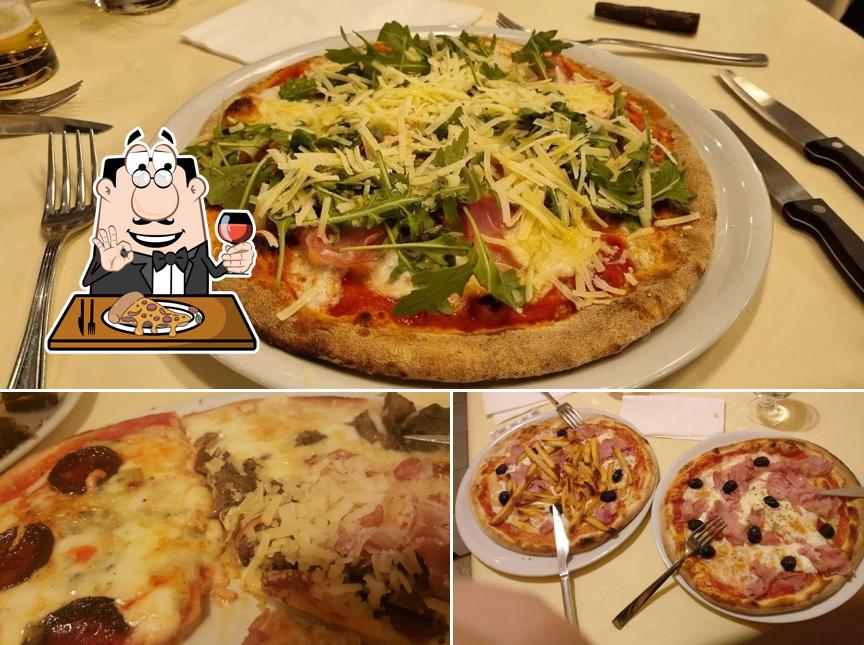 A Pizzeria al Rustico, puoi provare una bella pizza