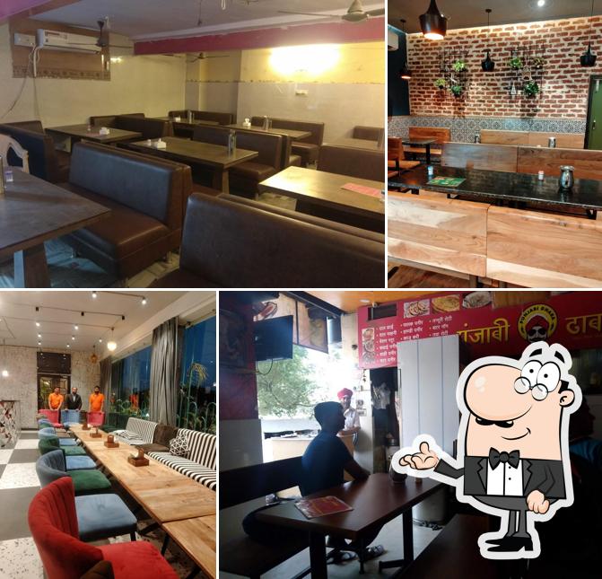 Take a seat at one of the tables at Punjabi Dhaba