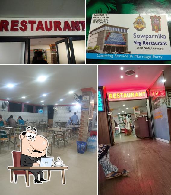 Take a seat at one of the tables at Sowparnika Restaurant