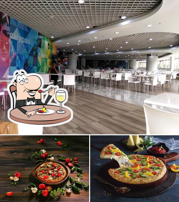 The photo of food and interior at Domino's Pizza K.R. Puram, Bengaluru