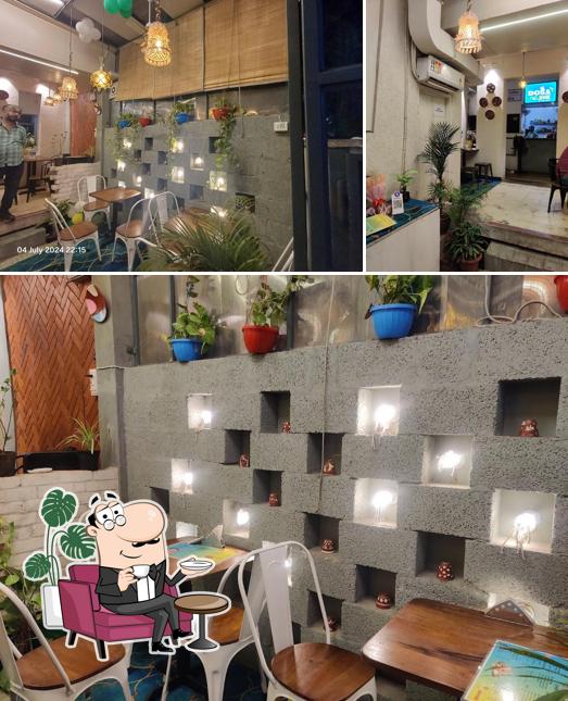 Take a seat at one of the tables at Dosa Anna-The Taste of South