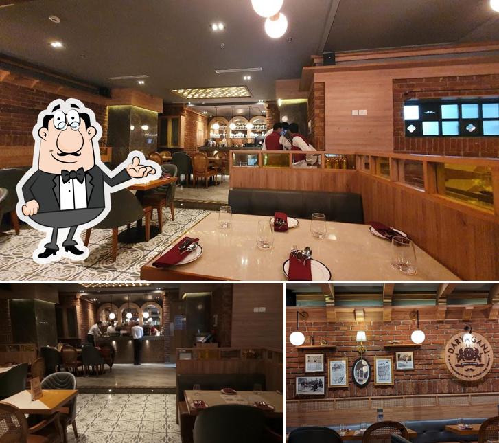 Take a seat at one of the tables at Daryaganj Restaurant