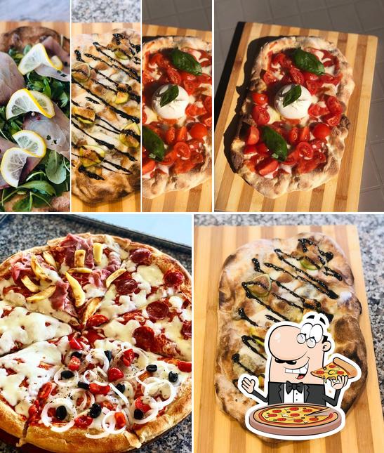 A Pizzeria Kiss Pizza, puoi ordinare una bella pizza