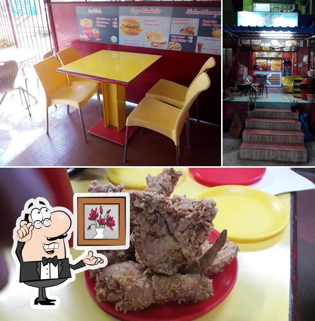 Take a look at the photo depicting interior and dessert at Kenshi Cafe