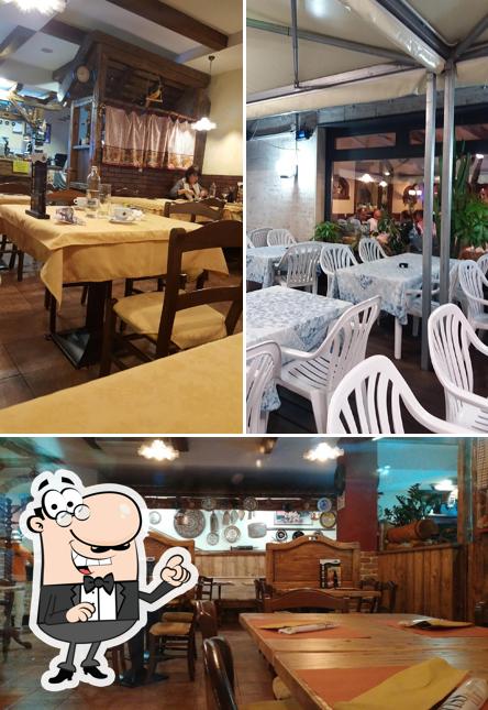 Siediti a un tavolo di Pizzeria San Marco